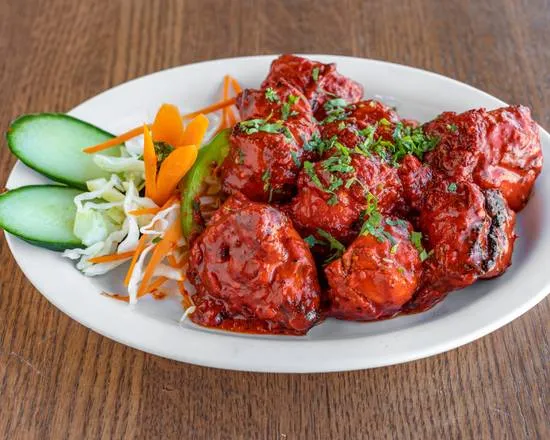 Butter Chicken Skillet — Fusion breakfast skillet at Sunny Side Up Sherwood Park